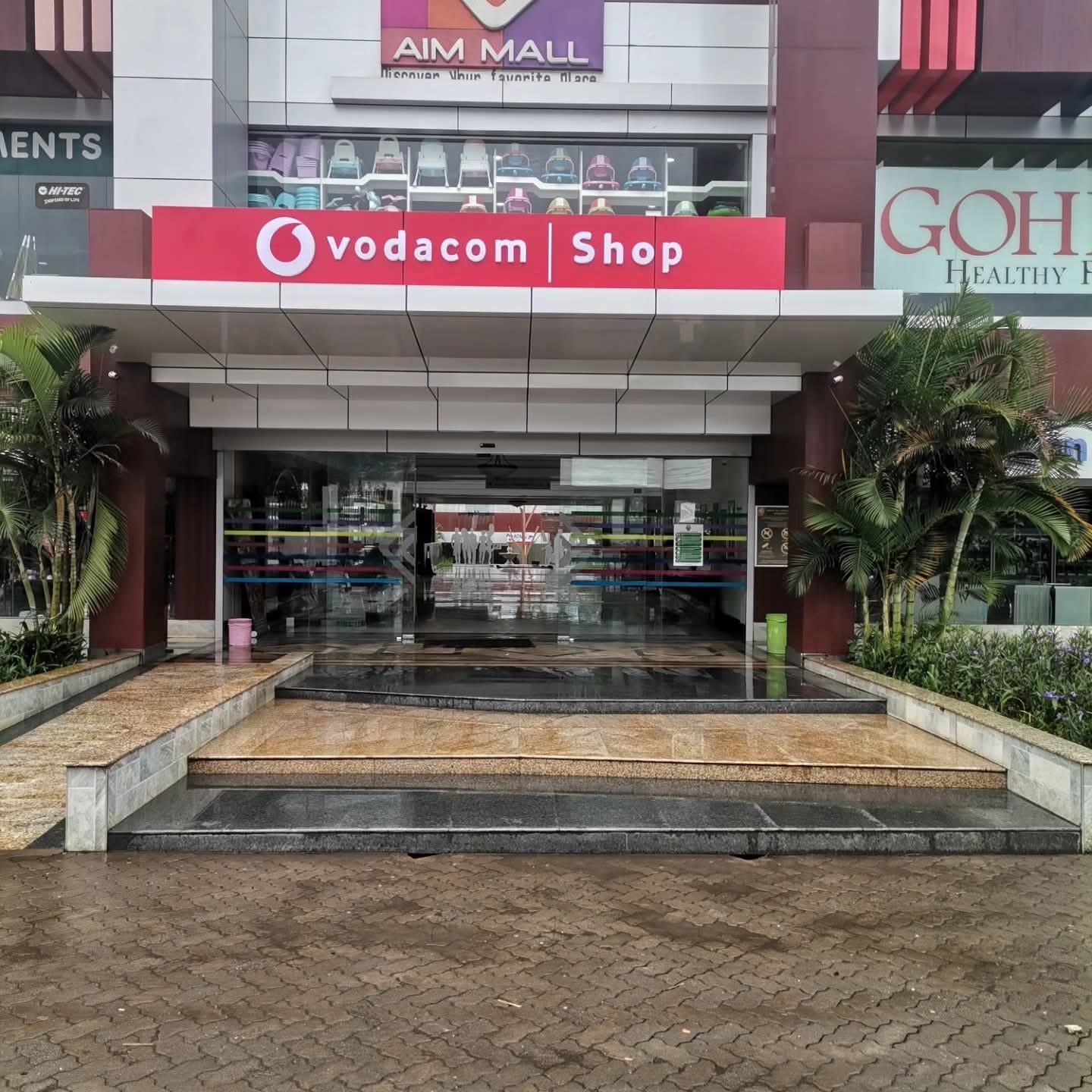 Vodacom Shop storefront branding and illuminated signage by Gravimark